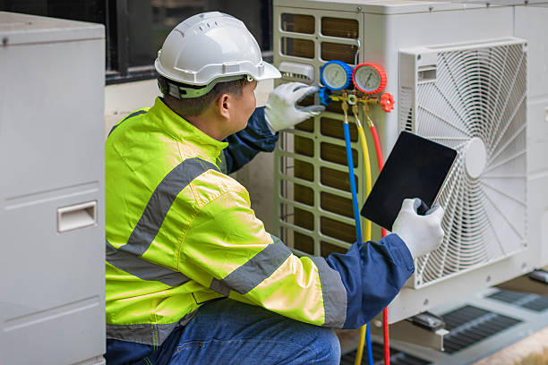 Professional Emergency Ac Repair technician working in Ballston Lake, NY